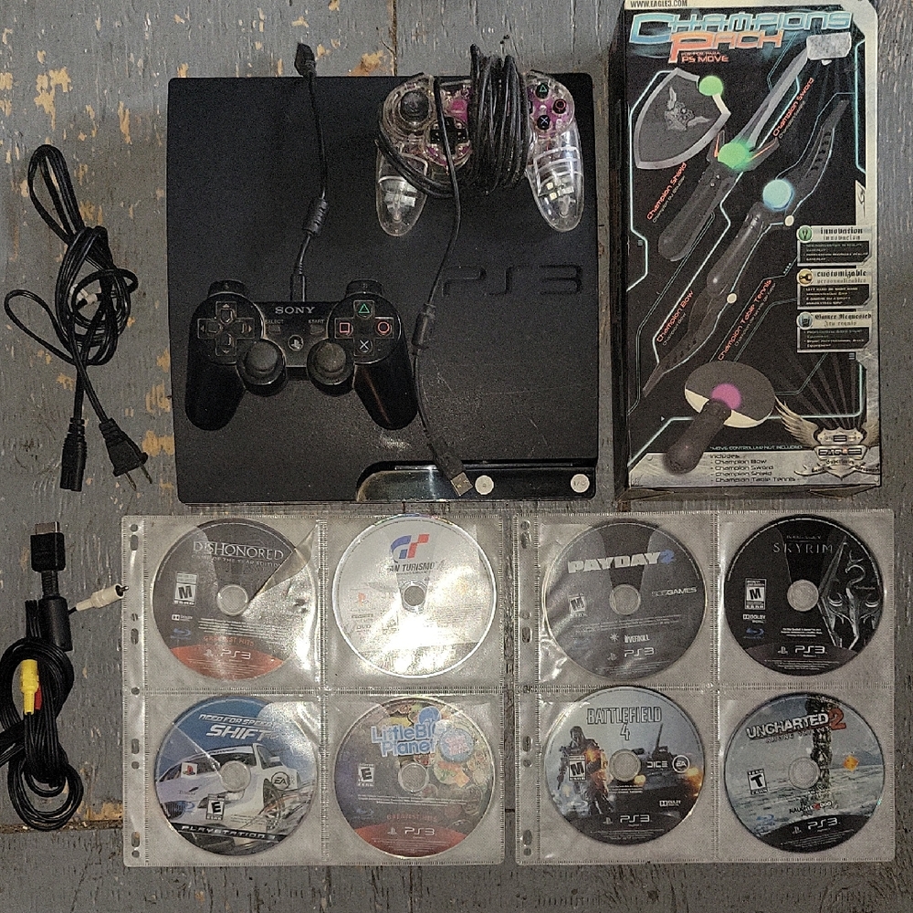 Sony PlayStation 3 Slim BUNDLE W/ Black Controllers & Eight (8) Games